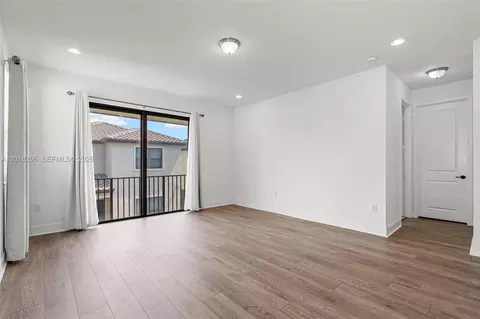 Living - 3323 W 96th Pl, Hialeah, FL 33018 photo 10 of 11