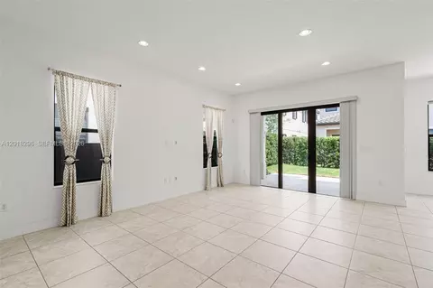 Living - 3323 W 96th Pl, Hialeah, FL 33018 photo 5 of 11