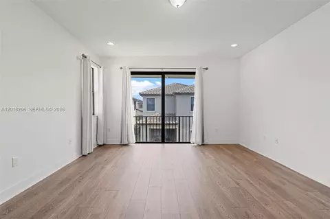 Living - 3323 W 96th Pl, Hialeah, FL 33018 photo 9 of 11