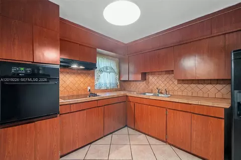 Kitchen - 511 Dunad Ave, Opa Locka, FL 33054 photo 1 of 3