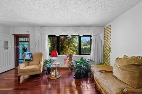 Living - 511 Dunad Ave, Opa Locka, FL 33054 photo 1 of 9
