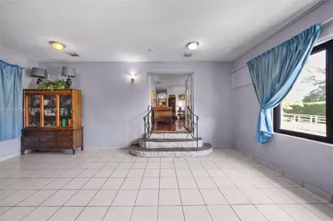 Living - 511 Dunad Ave, Opa Locka, FL 33054 photo 4 of 9