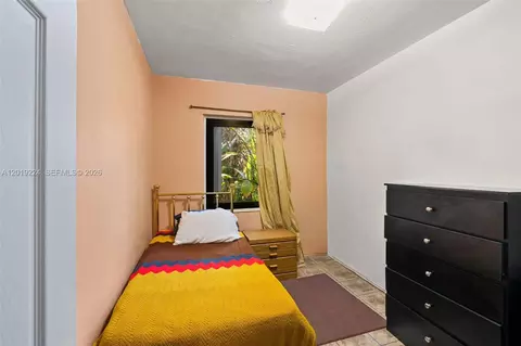 Bedroom - 511 Dunad Ave, Opa Locka, FL 33054 photo 5 of 6