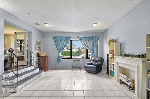 Living - 511 Dunad Ave, Opa Locka, FL 33054 photo 8 of 9