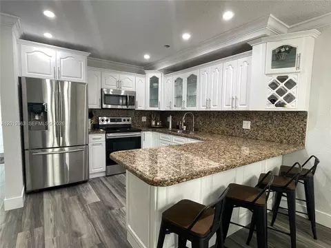 Kitchen - 6832 W 2nd Ct, Hialeah, FL 33014 photo 1 of 2