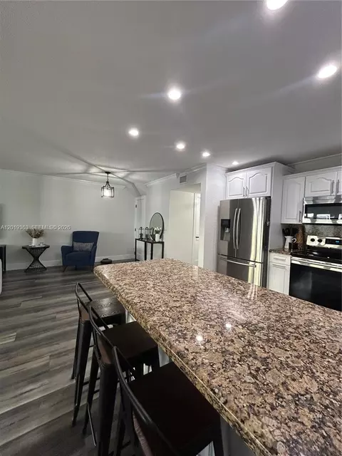Kitchen - 6832 W 2nd Ct, Hialeah, FL 33014 photo 2 of 2