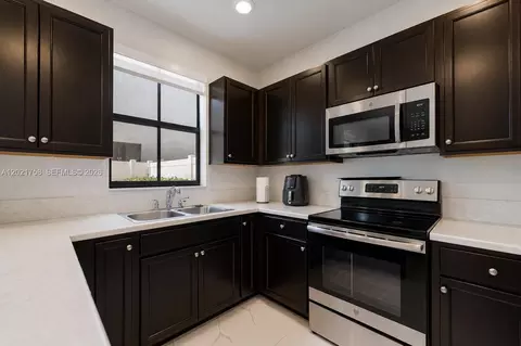 Kitchen - 3382 W 104th Ter, Hialeah, FL 33018 photo 2 of 2