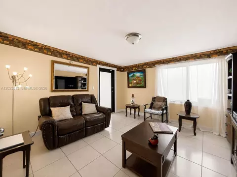 Living - 2462 W 65th St, Hialeah, FL 33016 photo 2 of 2