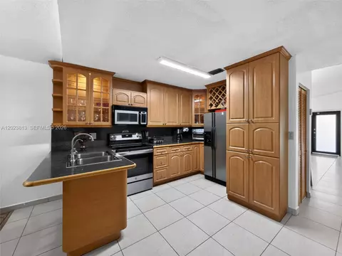 Kitchen - 2462 W 65th St, Hialeah, FL 33016 photo 2 of 3