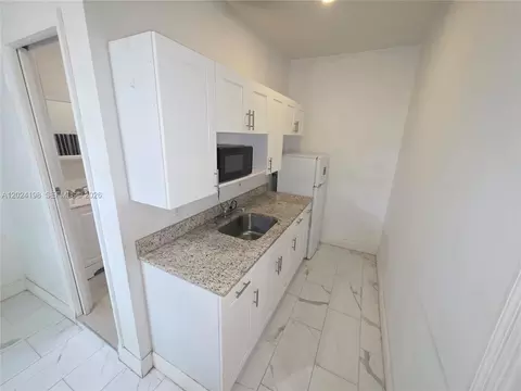 Kitchen - 651 E 48th St, Hialeah, FL 33013 photo 7 of 7