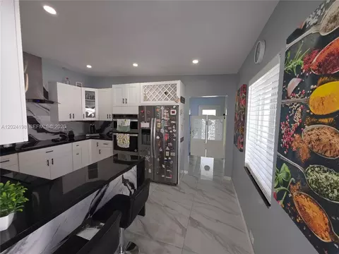 Kitchen - 651 E 48th St, Hialeah, FL 33013 photo 1 of 7
