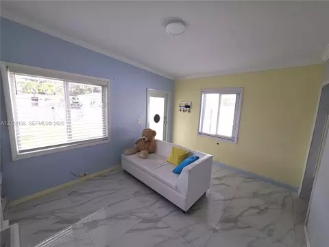 Living - 651 E 48th St, Hialeah, FL 33013 photo 3 of 3