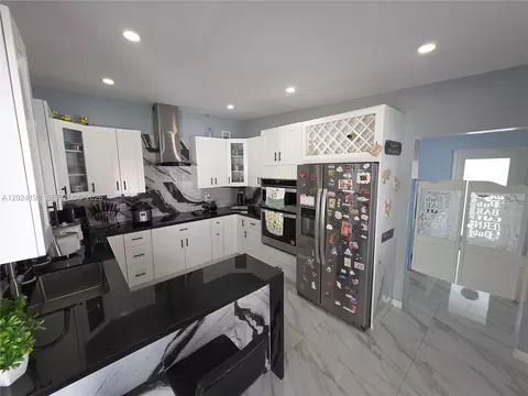 Kitchen - 651 E 48th St, Hialeah, FL 33013 photo 2 of 7