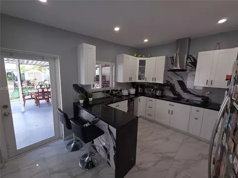 Kitchen - 651 E 48th St, Hialeah, FL 33013 photo 3 of 7