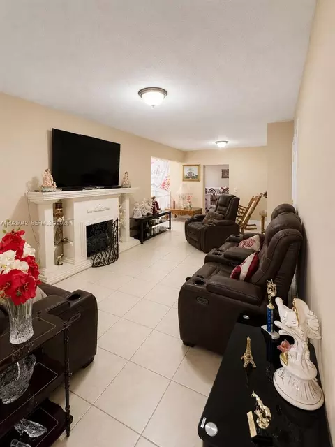 Living - 5551 E 4th Ave, Hialeah, FL 33013 photo 1 of 2