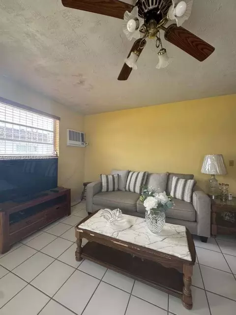 Living - 252 E 37th St, Hialeah, FL 33013 photo 2 of 4