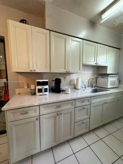 Kitchen - 252 E 37th St, Hialeah, FL 33013 photo 3 of 4