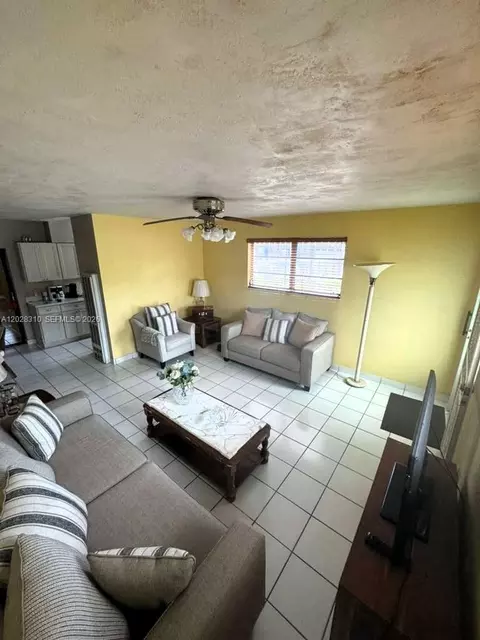 Living - 252 E 37th St, Hialeah, FL 33013 photo 3 of 4
