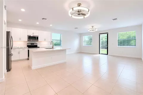 Living - 3448 W 110th Ter, Hialeah, FL 33018 photo 2 of 6