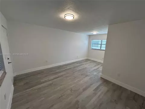 Living - 5960 W 25th Ct #102, Hialeah, FL 33016 photo 3 of 4