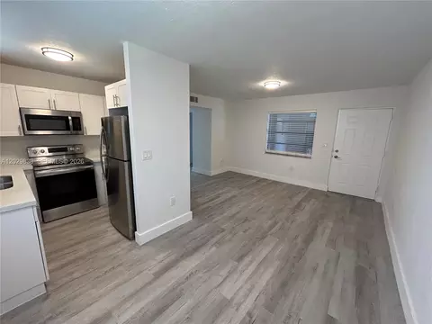 Living - 5960 W 25th Ct #102, Hialeah, FL 33016 photo 2 of 4