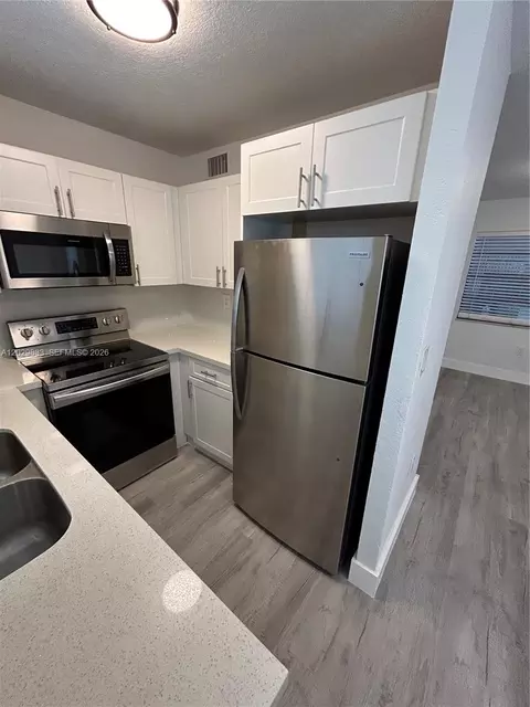 Kitchen - 5960 W 25th Ct #102, Hialeah, FL 33016 photo 3 of 4