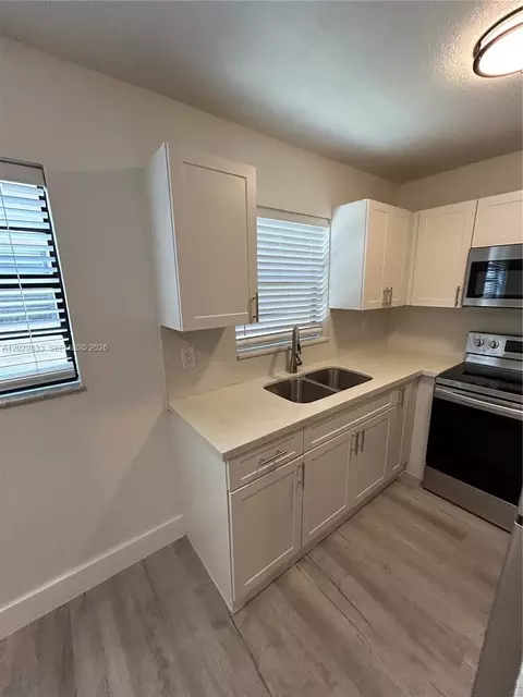 Kitchen - 5960 W 25th Ct #102, Hialeah, FL 33016 photo 2 of 4