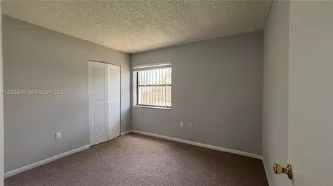 Bedroom - 10303 NW 9th St Cir #102-16, Miami, FL 33172 photo 6 of 6
