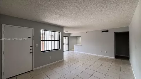 Living - 10303 NW 9th St Cir #102-16, Miami, FL 33172 photo 3 of 4