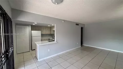 Living - 10303 NW 9th St Cir #102-16, Miami, FL 33172 photo 1 of 4