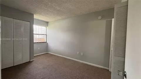 Bedroom - 10303 NW 9th St Cir #102-16, Miami, FL 33172 photo 1 of 6