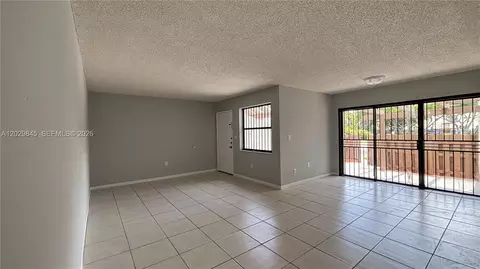 Living - 10303 NW 9th St Cir #102-16, Miami, FL 33172 photo 4 of 4