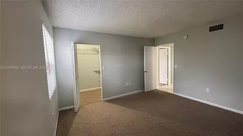 Bedroom - 10303 NW 9th St Cir #102-16, Miami, FL 33172 photo 5 of 6