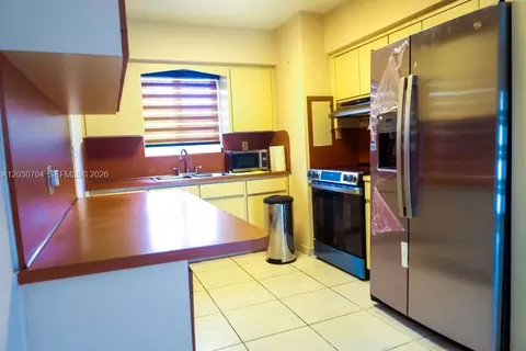 Kitchen - 161 E 36th St, Hialeah, FL 33013 photo 2 of 3