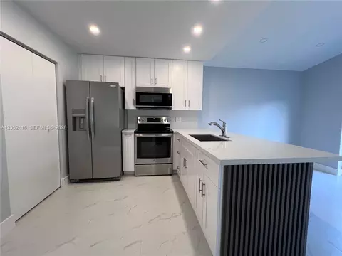 Kitchen - 2834 W 75th Ter, Hialeah, FL 33018 photo 2 of 3