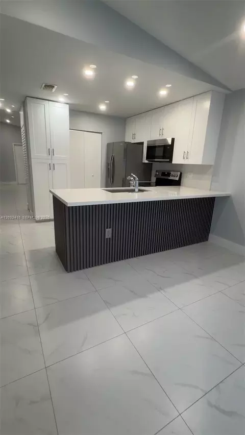 Kitchen - 2834 W 75th Ter, Hialeah, FL 33018 photo 3 of 3
