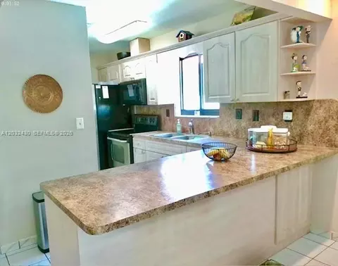 Kitchen - 6527 W 22nd Ln, Hialeah, FL 33016 photo 1 of 3