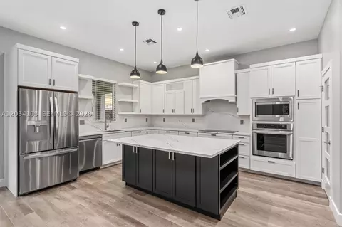 Kitchen - 2431 NE 20th Ave, Lighthouse Point, FL 33064 photo 3 of 4