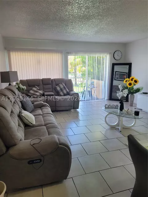 Living - 18101 NW 68th Ave #E105, Hialeah, FL 33015 photo 1 of 1