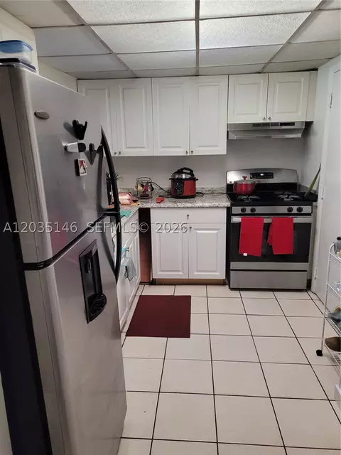 Kitchen - 18101 NW 68th Ave #E105, Hialeah, FL 33015 photo 1 of 3