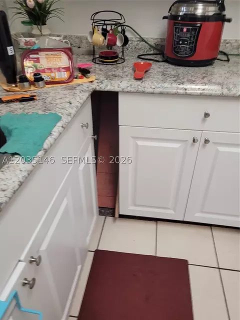 Kitchen - 18101 NW 68th Ave #E105, Hialeah, FL 33015 photo 3 of 3