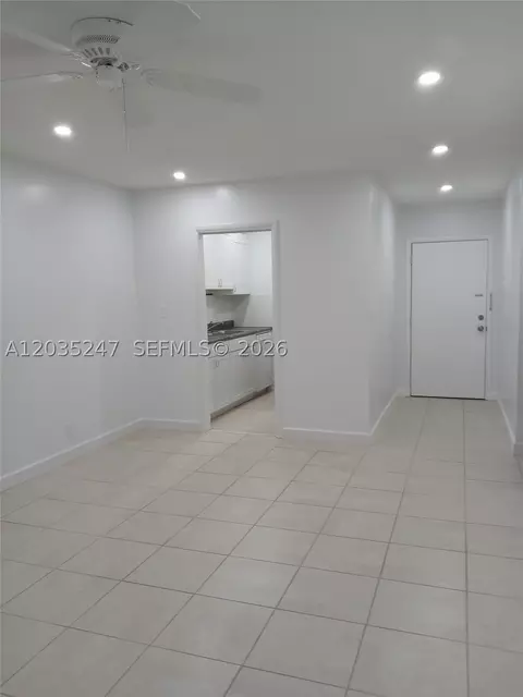 Living - 1250 E Sample Rd #303, Pompano Beach, FL 33064 photo 2 of 2