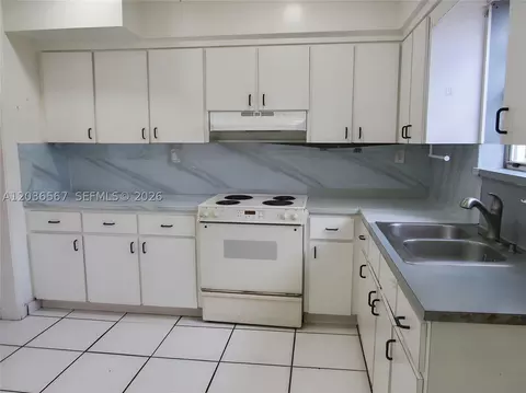 Kitchen - 447 E 32nd St, Hialeah, FL 33013 photo 1 of 3