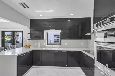 Kitchen - 11 W 59th St, Hialeah, FL 33012 photo 1 of 3