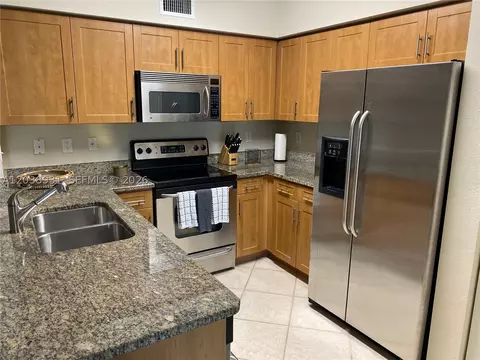 6400 Emerald Dunes Dr #303, West Palm Beach, FL 33411