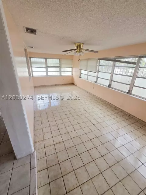 Living - 405 SE 4th Ave, Hialeah, FL 33010 photo 2 of 3