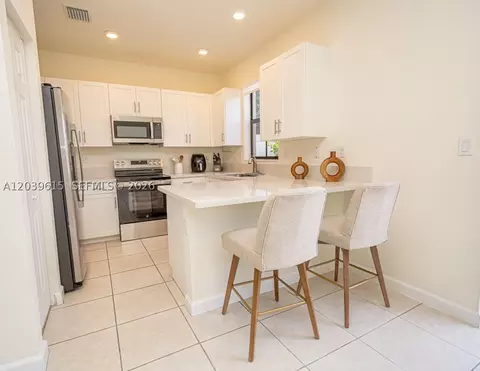 Kitchen - 11064 W 33rd Way, Hialeah, FL 33018 photo 1 of 7