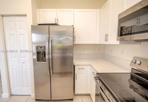 Kitchen - 11064 W 33rd Way, Hialeah, FL 33018 photo 5 of 7