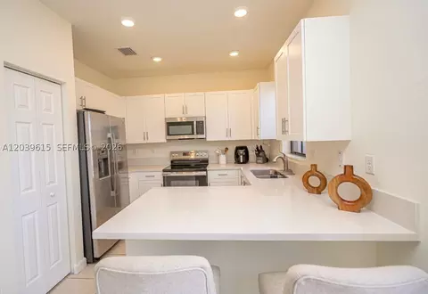 Kitchen - 11064 W 33rd Way, Hialeah, FL 33018 photo 3 of 7