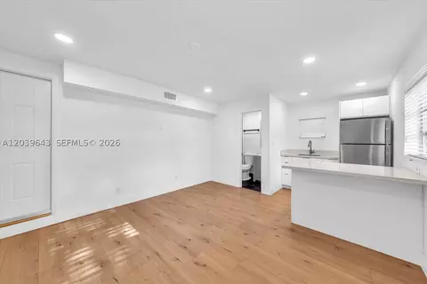 Living - 4719 E 8th Ct, Hialeah, FL 33013 photo 5 of 6